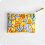 Borsellino realizzato con tessuto stampato con fiori gialli e bianchi